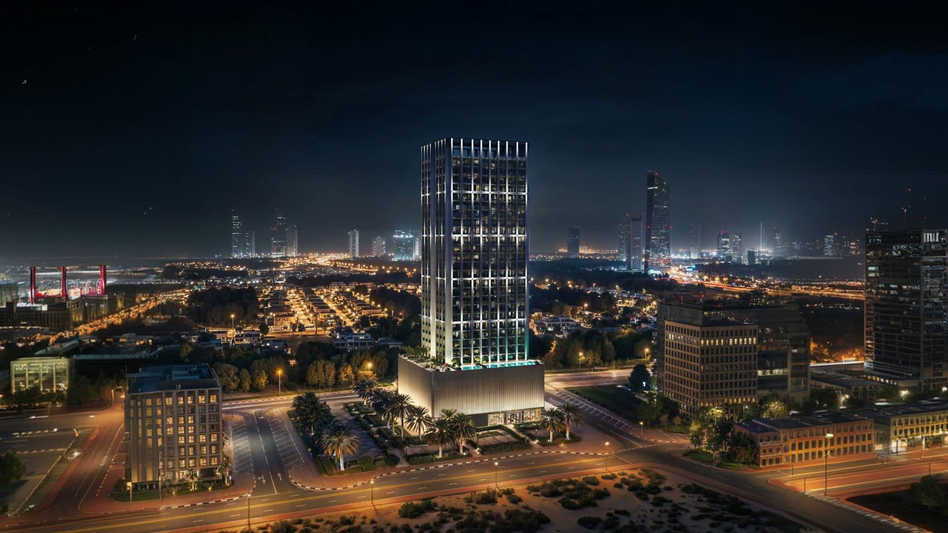Binghatti Etherea tower in Jumeirah Village Circle at night
