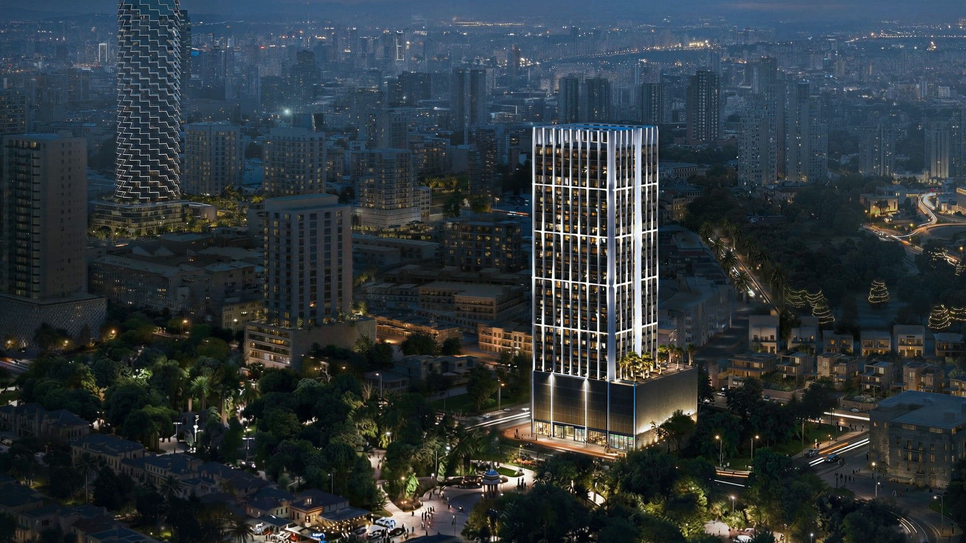 Binghatti Etherea tower at night with the Dubai skyline