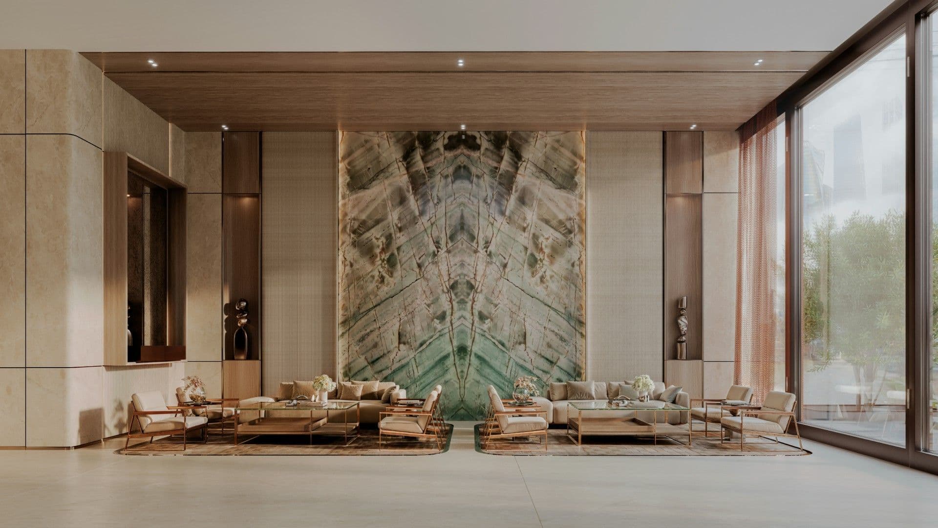 Lobby lounge with a marble feature wall at Binghatti Luxuria