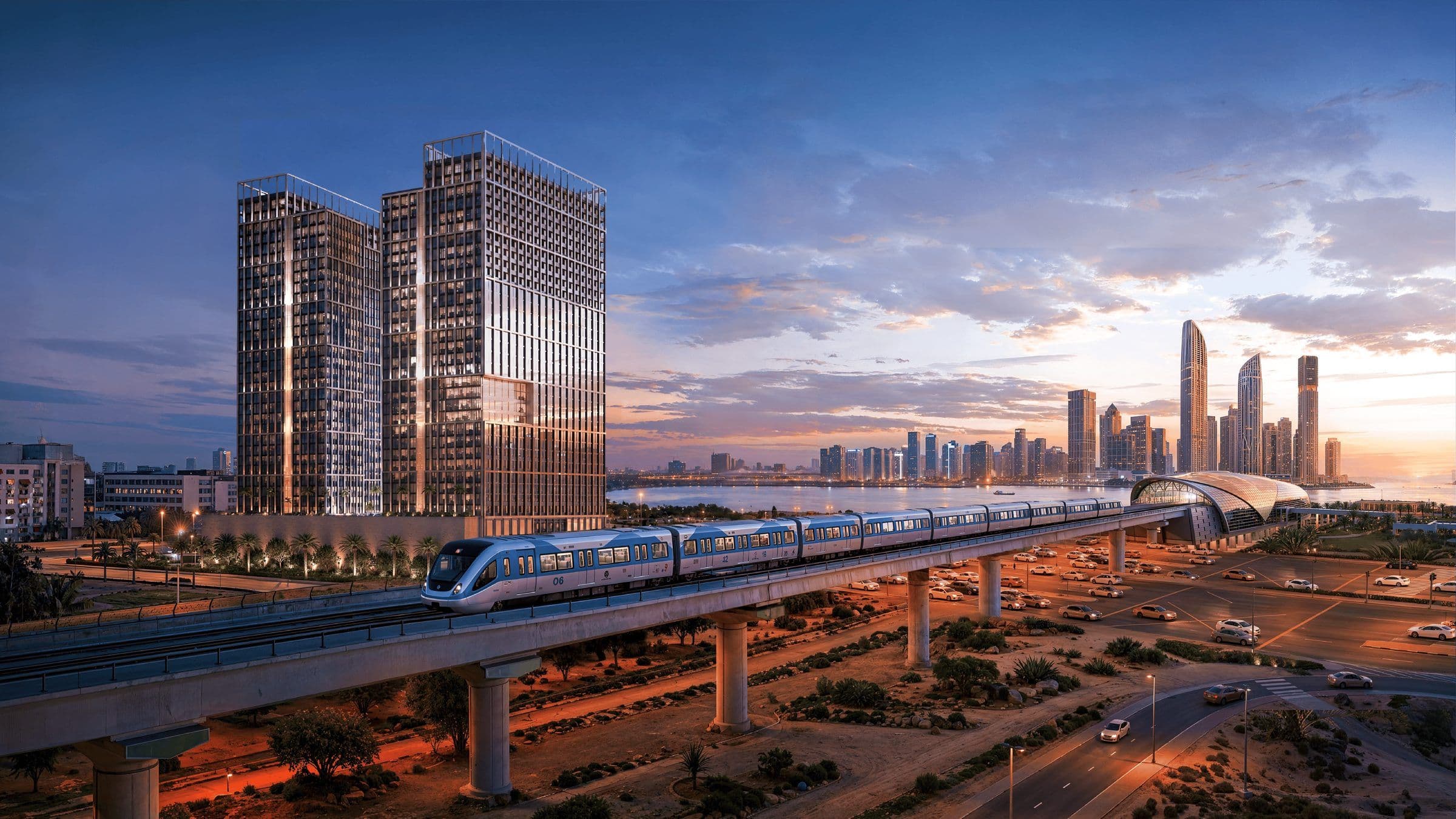 Binghatti Spectre towers and the Dubai Metro line at dusk