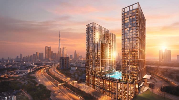 Binghatti Spectre towers in Al Jaddaf at sunset with the Downtown Dubai skyline