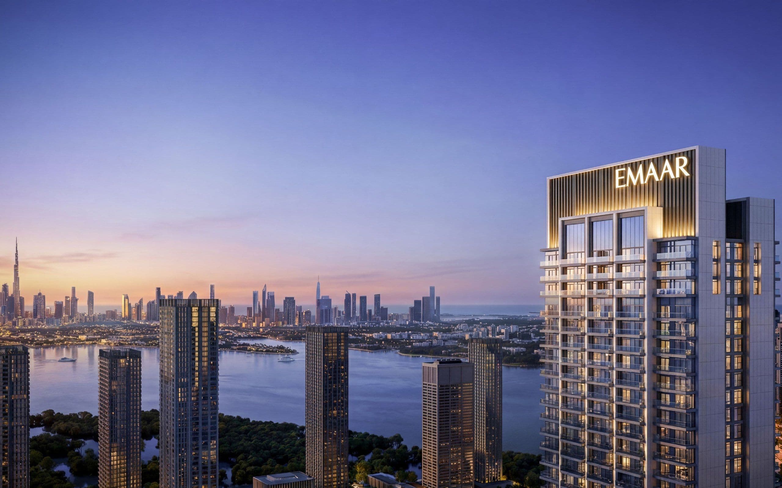 Valia tower by Emaar at dusk with Dubai Creek and the Downtown Dubai skyline